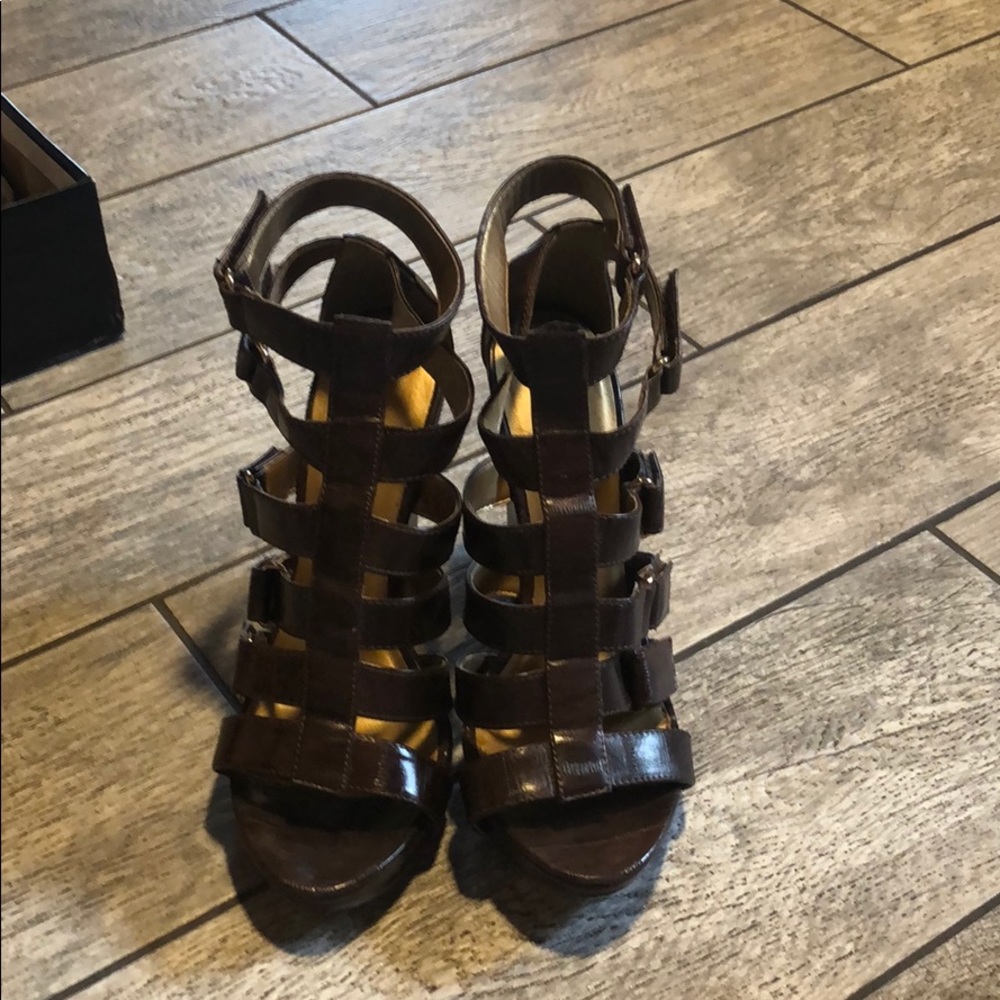 Michael Antonio wedge sandals.